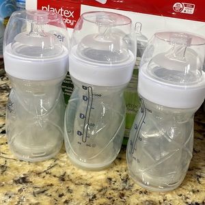 Three 4oz Playtex drop in bottles